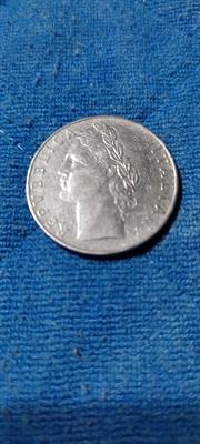 100 lire del 1957 con errore di conio