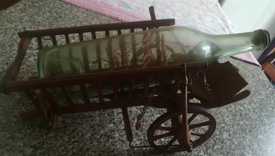 Carretto con bottiglia