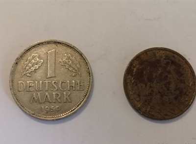 100 Dollari + 1 Mark